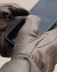 The Original gloves typing on a touch screen phone